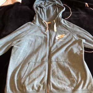 Light blue nike zip up. Size kids mediums